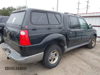 2003 Ford Explorer Sport Trac XLS z VIN 1FMZU77E43UB90738, wystawiony jako IAAI lot #41607465 z przebiegiem 223 708 mil mil oraz . Historia ofert i sprzedaży dostępna na DreamBid. Obrazek 4.