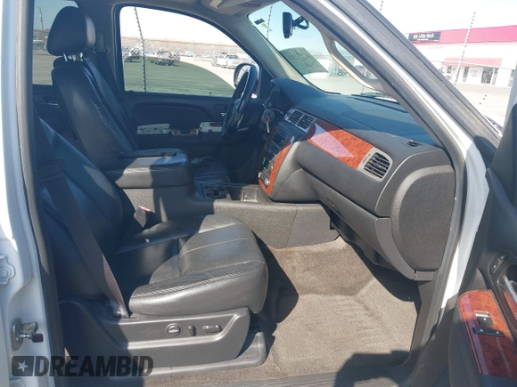 2014 Chevrolet Tahoe LT with VIN 1GNSCBE06ER233105, listed as a IAAI auction lot 41753190 with 161,056 mi miles and . Bid and sale history available at DreamBid. Image 5.