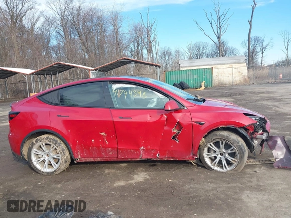 2023 Tesla Model Y Long Range with VIN 7SAYGDEE7PF672887, listed as a IAAI auction lot 41744398 with Not Provided miles. Bid and sale history available at carsss.com. Image 12.