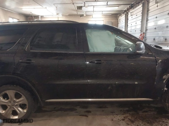 2014 Dodge Durango Limited with VIN 1C4RDJDG1EC973130, listed as a IAAI auction lot 41846596 with 166,182 mi miles. Bid and sale history available at carsss.com. Image 13.