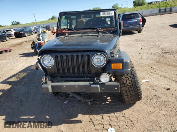 2004 Jeep Wrangler Sport with VIN 1J4FA49S04P751464, listed as a Copart auction lot 61686865 with Not provided miles and Salvage title. Bid and sale history available at DreamBid. Image 5.