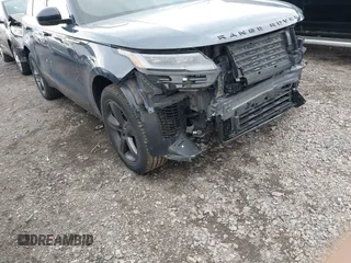 2025 Land Rover Range Rover Velar Dynamic SE with VIN SALYL2EX9SA809479, listed as a IAAI auction lot 42150495 with 7,038 mi miles and . Bid and sale history available at DreamBid. Image 18.