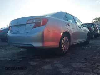 2014 Toyota Camry L with VIN 4T1BF1FK9EU392719, listed as a IAAI auction lot 41090249 with 168,064 mi miles. Bid and sale history available at carsss.com. Image 4.