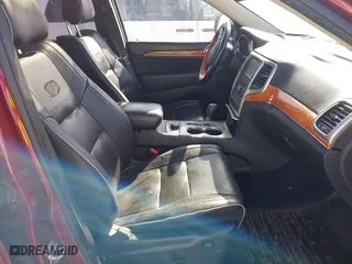 2012 Jeep Grand Cherokee Overland with VIN 1C4RJFCTXCC166770, listed as a IAAI auction lot 41833086 with 175,656 mi miles. Bid and sale history available at carsss.com. Image 5.