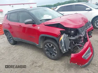 2020 Jeep Compass Trailhawk with VIN 3C4NJDDB5LT166656, listed as a IAAI auction lot 42184661 with 131,080 mi miles and . Bid and sale history available at DreamBid. Image 1.