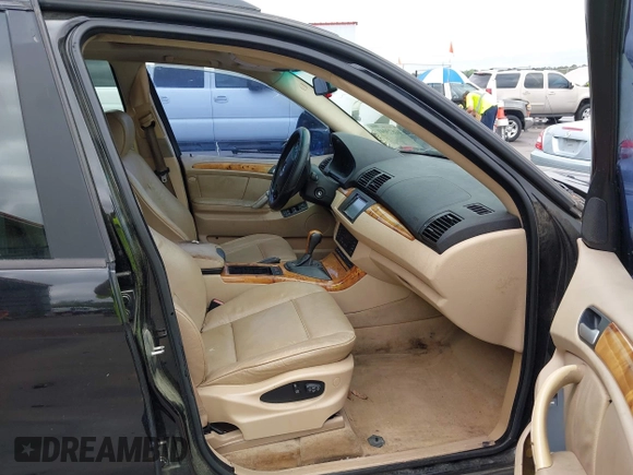 2003 BMW X5 3.0i with VIN 5UXFA53563LW26813, listed as a IAAI auction lot 41873041 with 188,523 mi miles. Bid and sale history available at carsss.com. Image 5.