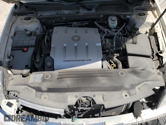2006 Cadillac DTS 1SB z VIN 1G6KD57Y86U126164, wystawiony jako Copart lot #52686965 z przebiegiem 153 426 mil mil oraz Szkoda całkowita • Salvage title. Historia ofert i sprzedaży dostępna na DreamBid. Obrazek 11.