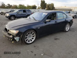 2006 BMW 7 Series 750i with VIN WBAHL83506DT05674, listed as a Copart auction lot 77176834 with 263,495 mi miles and Salvage Title. Bid and sale history available at carsss.com. Image 1.