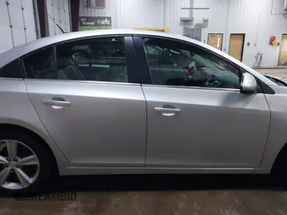 2014 Chevrolet Cruze 2LT z VIN 1G1PE5SB4E7393620, wystawiony jako IAAI lot #42056437 z przebiegiem 173 687 mil mil oraz . Historia ofert i sprzedaży dostępna na DreamBid. Obrazek 13.