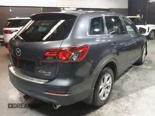 2013 Mazda CX-9 Touring z VIN JM3TB3CV0D0415199, wystawiony jako IAAI lot #42029040 z przebiegiem 154 404 mil mil oraz . Historia ofert i sprzedaży dostępna na DreamBid. Obrazek 4.