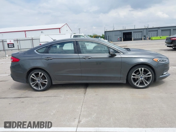 2017 Ford Fusion Titanium with VIN 3FA6P0D93HR261526, listed as a IAAI auction lot 42277350 with 117,388 mi miles and . Bid and sale history available at DreamBid. Image 13.
