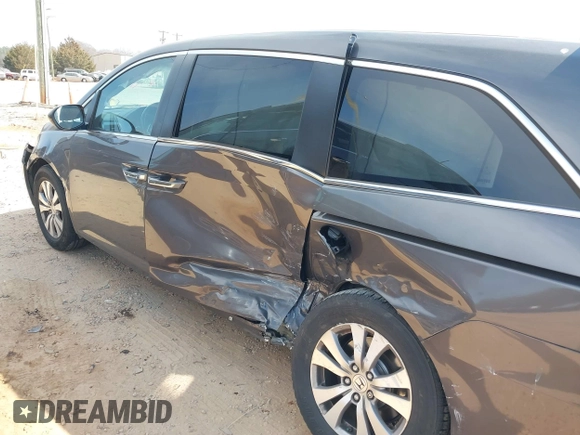 2016 Honda Odyssey EX-L with VIN 5FNRL5H61GB099699, listed as a IAAI auction lot 41807964 with 67,041 mi miles and . Bid and sale history available at DreamBid. Image 6.