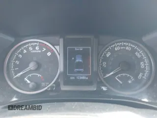 2020 Toyota Tacoma SR5 with VIN 3TMBZ5DN7LM026596, listed as a IAAI auction lot 40705410 with 123,489 mi miles and . Bid and sale history available at DreamBid. Image 7.