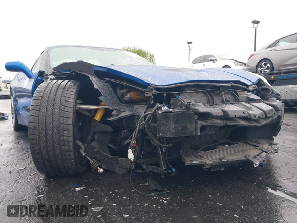 2016 Chevrolet Corvette Z51 3LT z VIN 1G1YM2D74G5116883, wystawiony jako IAAI lot #42160585 z przebiegiem 25 939 mil mil oraz . Historia ofert i sprzedaży dostępna na DreamBid. Obrazek 6.