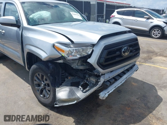 2023 Toyota Tacoma SR with VIN 3TYCZ5AN4PT149730, listed as a IAAI auction lot 42083146 with 31,731 mi miles and . Bid and sale history available at DreamBid. Image 6.