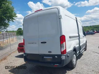 2015 Ford Transit Cargo with VIN 1FTNE2CMXFKA90627, listed as a IAAI auction lot 40601859 with 230,893 mi miles. Bid and sale history available at carsss.com. Image 4.