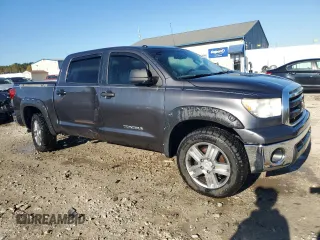 2011 Toyota Tundra 4WD Truck with VIN 5TFDM5F11BX019427, listed as a Copart auction lot 75472504 with 144,181 mi miles and Salvage Title. Bid and sale history available at carsss.com. Image 4.