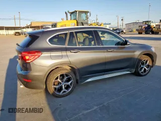 2019 BMW X1 xDrive28i with VIN WBXHT3C51K3H34687, listed as a Copart auction lot 50135845 with 59,549 mi miles and Salvage Title. Bid and sale history available at carsss.com. Image 3.