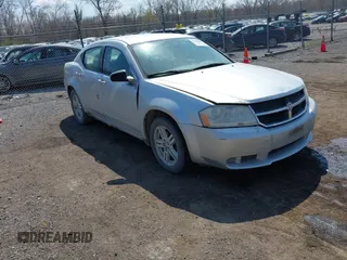 2008 Dodge Avenger SXT with VIN 1B3LC56K28N684317, listed as a IAAI auction lot 41988986 with 241,325 mi miles and . Bid and sale history available at DreamBid. Image 1.