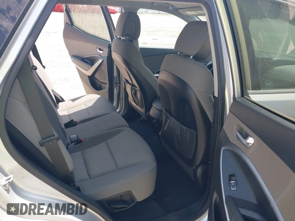 2018 Hyundai Santa Fe 2.4L with VIN 5XYZT3LB4JG557373, listed as a IAAI auction lot 42511741 with 142,572 mi miles and . Bid and sale history available at DreamBid. Image 8.