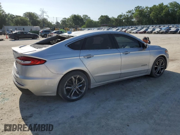 2019 Ford Fusion Titanium with VIN 3FA6P0RU1KR209297, listed as a Copart auction lot 54358065 with 122,600 mi miles and Salvage Title. Bid and sale history available at DreamBid. Image 3.