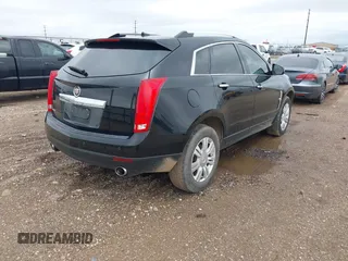 2011 Cadillac SRX Luxury Collection z VIN 3GYFNAEY7BS622584, wystawiony jako IAAI lot #42450036 z przebiegiem 140 250 mil mil oraz . Historia ofert i sprzedaży dostępna na DreamBid. Obrazek 4.
