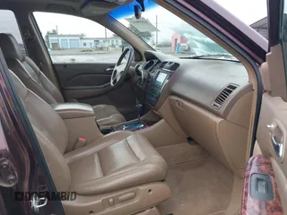 2002 Acura MDX Touring Pkg with VIN 2HNYD18652H500976, listed as a IAAI auction lot 41450892 with 174,921 mi miles. Bid and sale history available at carsss.com. Image 5.