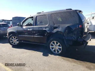 2011 GMC Yukon Denali with VIN 1GKS2EEF6BR137914, listed as a Copart auction lot 72957134 with 109,574 mi miles and Salvage Title. Bid and sale history available at carsss.com. Image 2.