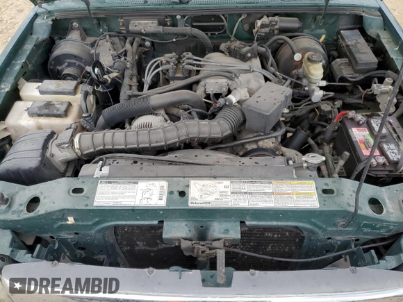 1999 Ford Ranger XL z VIN 1FTYR14V6XPB24151, wystawiony jako Copart lot #56316045 z przebiegiem 195 845 mil mil oraz Szkoda całkowita • Salvage title. Historia ofert i sprzedaży dostępna na DreamBid. Obrazek 11.