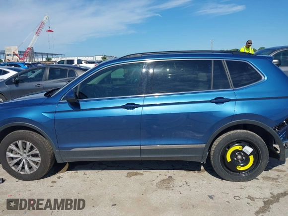 2018 Volkswagen Tiguan SEL z VIN 3VV3B7AX2JM155306, wystawiony jako IAAI lot #42457735 z przebiegiem 48 061 mil mil oraz . Historia ofert i sprzedaży dostępna na DreamBid. Obrazek 14.