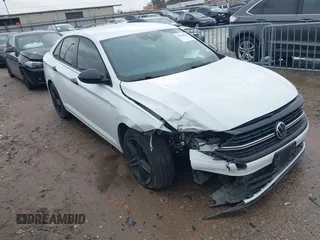 2022 Volkswagen Jetta Sport with VIN 3VWBM7BU1NM001598, listed as a IAAI auction lot 41544461 with 38,699 mi miles and . Bid and sale history available at DreamBid. Image 1.