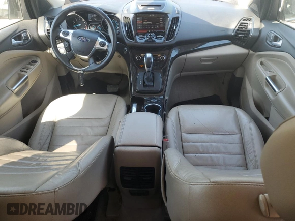 2015 Ford Escape Titanium with VIN 1FMCU9J92FUC74879, listed as a Copart auction lot 54683185 with 143,436 mi miles and Salvage title. Bid and sale history available at DreamBid. Image 8.