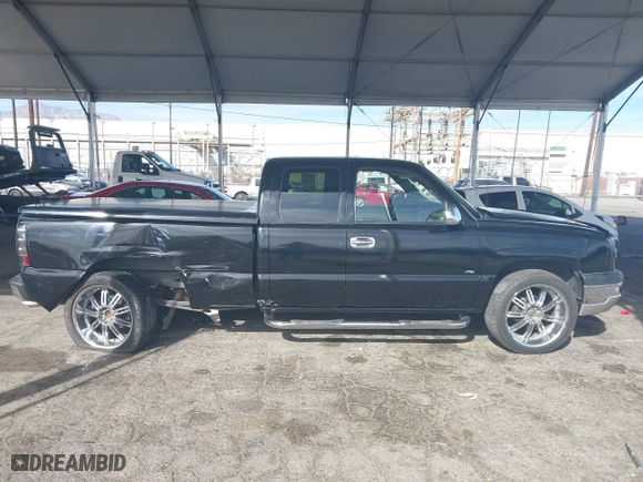 2003 Chevrolet Silverado 1500 LS with VIN 1GCEK19T53E131290, listed as a IAAI auction lot 41414921 with 191,890 mi miles. Bid and sale history available at carsss.com. Image 14.
