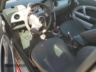 2004 MINI Hardtop z VIN WMWRC334X4TC51255, wystawiony jako Copart lot #55153845 z przebiegiem 161 362 mil mil oraz Szkoda całkowita • Salvage title. Historia ofert i sprzedaży dostępna na DreamBid. Obrazek 8.