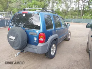 2003 Jeep Liberty Sport with VIN 1J4GL48K23W685486, listed as a IAAI auction lot 42094185 with 156,690 mi miles. Bid and sale history available at carsss.com. Image 4.