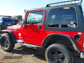 2004 Jeep Wrangler Sport Right Hand Drive with VIN 1J4F449S74P796957, listed as a IAAI auction lot 41987562 with 106,730 mi miles and . Bid and sale history available at carsss.com. Image 14.