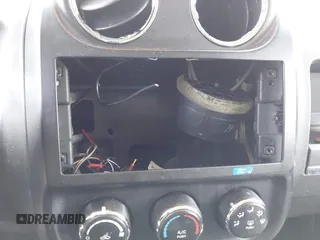 2014 Jeep Patriot Sport with VIN 1C4NJRBB1ED811019, listed as a IAAI auction lot 42181813 with 124,837 mi miles and . Bid and sale history available at DreamBid. Image 6.