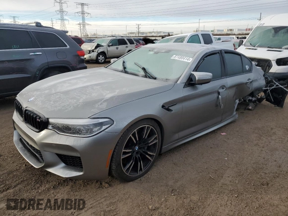 2018 BMW M5 z VIN WBSJF0C56JB282184, wystawiony jako Copart lot #87480414 z przebiegiem Nie podano mil oraz Szkody całkowita. Historia ofert i sprzedaży dostępna na DreamBid. Obrazek 1.
