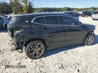2021 BMW X2 sDrive28i with VIN WBXYH9C08M5S47984, listed as a Copart auction lot 74954164 with 70,829 mi miles and Salvage Title. Bid and sale history available at carsss.com. Image 3.