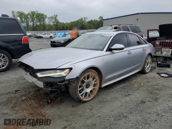 2016 Audi A6 Prestige with VIN WAUHGAFC2GN063620, listed as a Copart auction lot 52552945 with 203,877 mi miles and Salvage title. Bid and sale history available at DreamBid. Image 1.