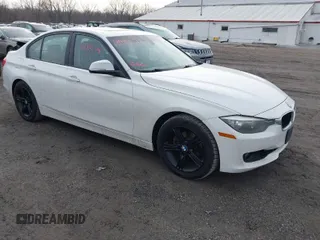2013 BMW 3 Series 328i xDrive with VIN WBA3B5G5XDNS02162, listed as a IAAI auction lot 41484578 with 132,211 mi miles. Bid and sale history available at carsss.com. Image 1.
