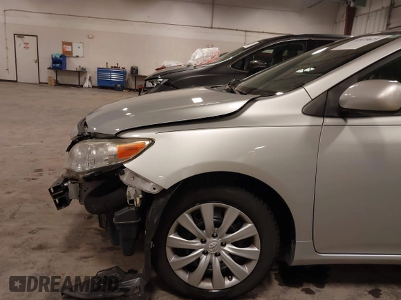 2012 Toyota Corolla L with VIN 5YFBU4EE0CP067121, listed as a IAAI auction lot 41973623 with 46,561 mi miles and . Bid and sale history available at DreamBid. Image 19.