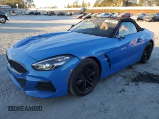 2022 BMW Z4 sDrive30i with VIN WBAHF3C02NWX38818, listed as a Copart auction lot 76604404 with 16,402 mi miles and Salvage Title. Bid and sale history available at carsss.com. Image 1.