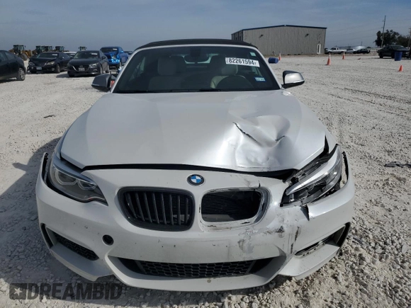 2016 BMW 2 Series M235i with VIN WBA1M1C52GV394052, listed as a Copart auction lot 82261594 with 83,979 mi miles and Salvage Title. Bid and sale history available at carsss.com. Image 5.