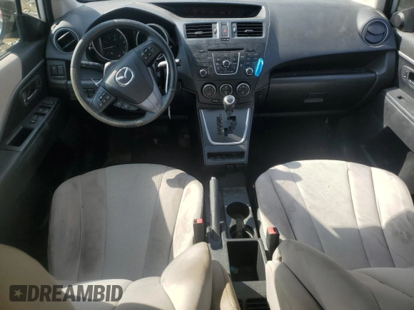 2014 Mazda 5 Touring with VIN JM1CW2CL5E0165062, listed as a Copart auction lot 72452994 with 177,939 mi miles and Salvage Title. Bid and sale history available at DreamBid. Image 8.