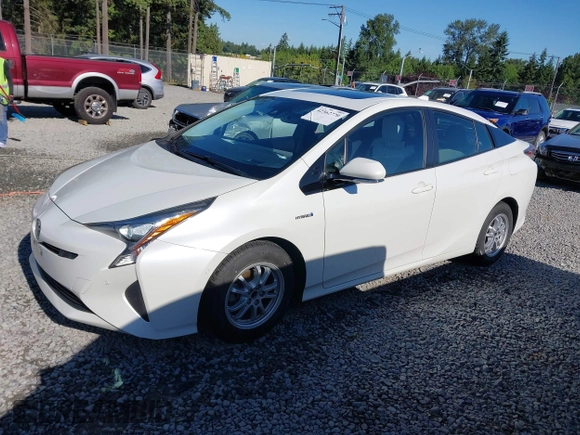 2017 Toyota Prius Two z VIN JTDKARFU1H3033538, wystawiony jako IAAI lot #42362770 z przebiegiem 74 671 mil mil oraz . Historia ofert i sprzedaży dostępna na DreamBid. Obrazek 14.