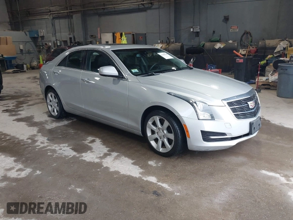 2016 Cadillac ATS Standard AWD z VIN 1G6AG5RX6G0149829, wystawiony jako IAAI lot #42165534 z przebiegiem 40 996 mil mil oraz . Historia ofert i sprzedaży dostępna na DreamBid. Obrazek 1.
