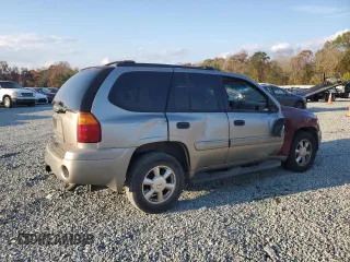 2003 GMC Envoy SLE with VIN 1GKDS13S732156385, listed as a Copart auction lot 79925184 with 233,958 mi miles and Salvage Title. Bid and sale history available at carsss.com. Image 3.