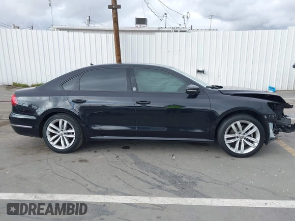 2019 Volkswagen Passat 2.0T Wolfsburg Edition with VIN 1VWLA7A34KC012887, listed as a IAAI auction lot 41792604 with 70,237 mi miles. Bid and sale history available at carsss.com. Image 14.