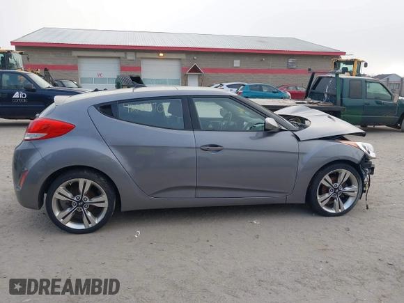 2014 Hyundai Veloster with VIN KMHTC6AD5EU183478, listed as a IAAI auction lot 42107170 with 64,905 mi miles. Bid and sale history available at carsss.com. Image 14.